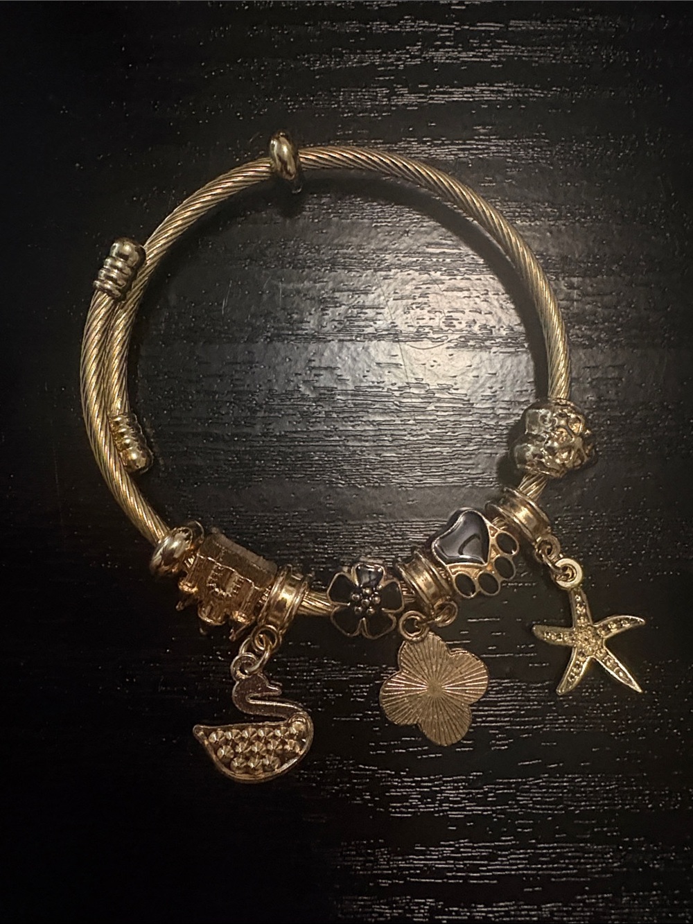 Gold-Tone Charm Bangle Bracelet with Floral and Nautical Charms
